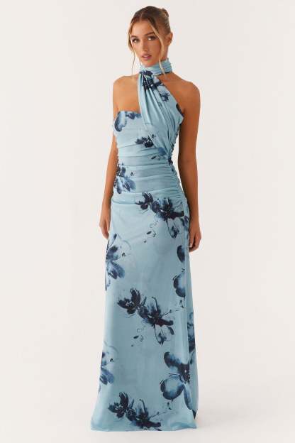 Blue floral halter maxi dress with ruched bodice and adjustable neck tie