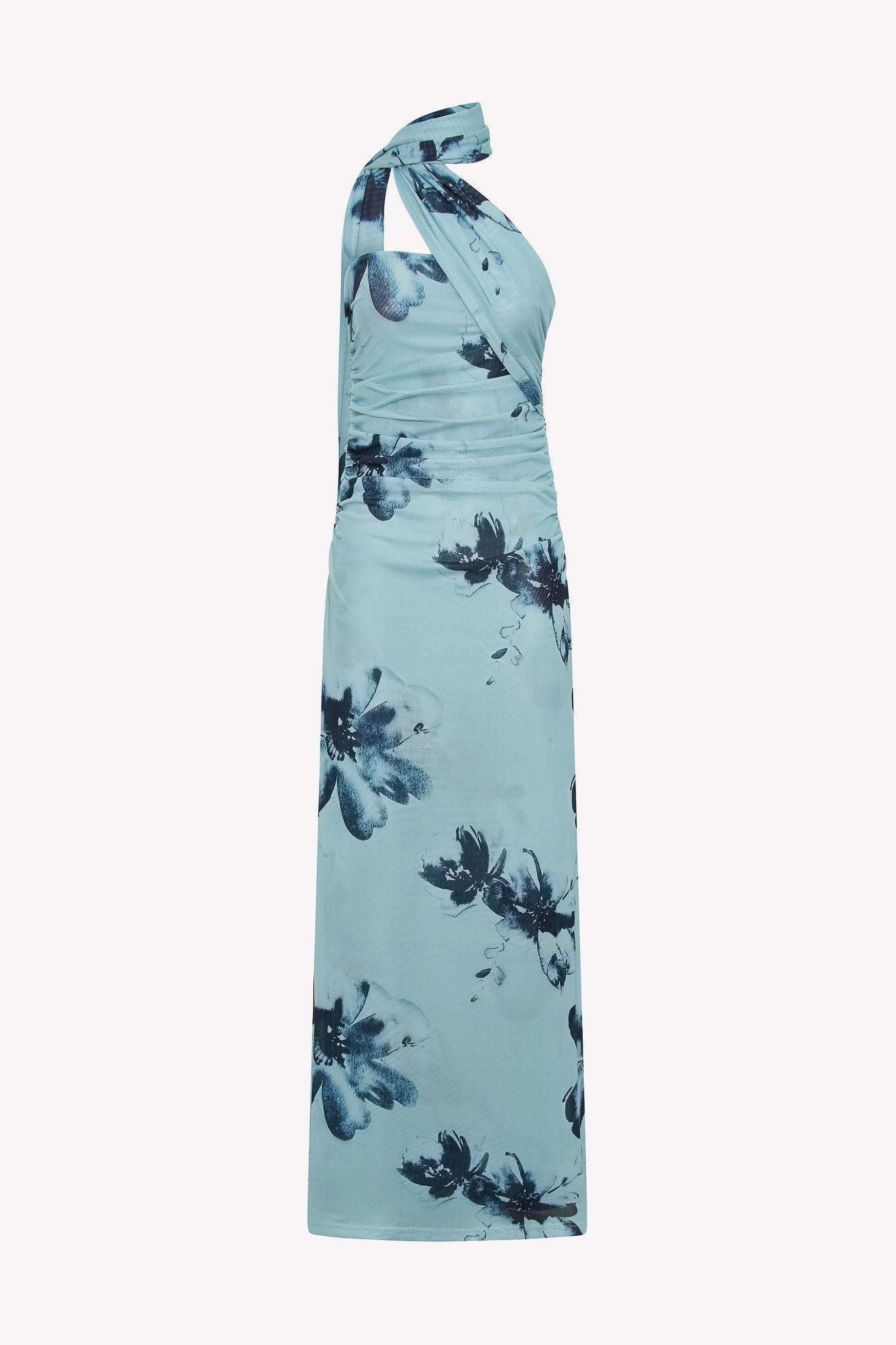 Light blue maxi dress with dark floral blooms and ruched horizontal detailing throughout