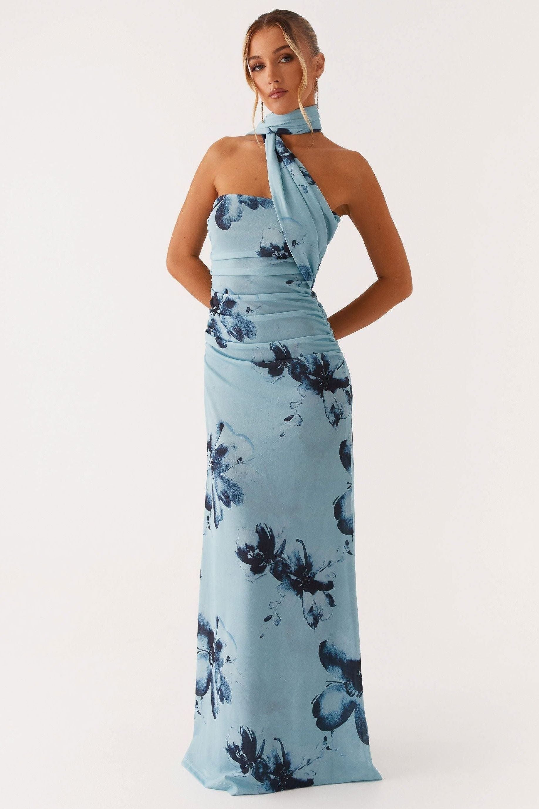 Light blue halter maxi dress with dark floral print and ruched waist detail