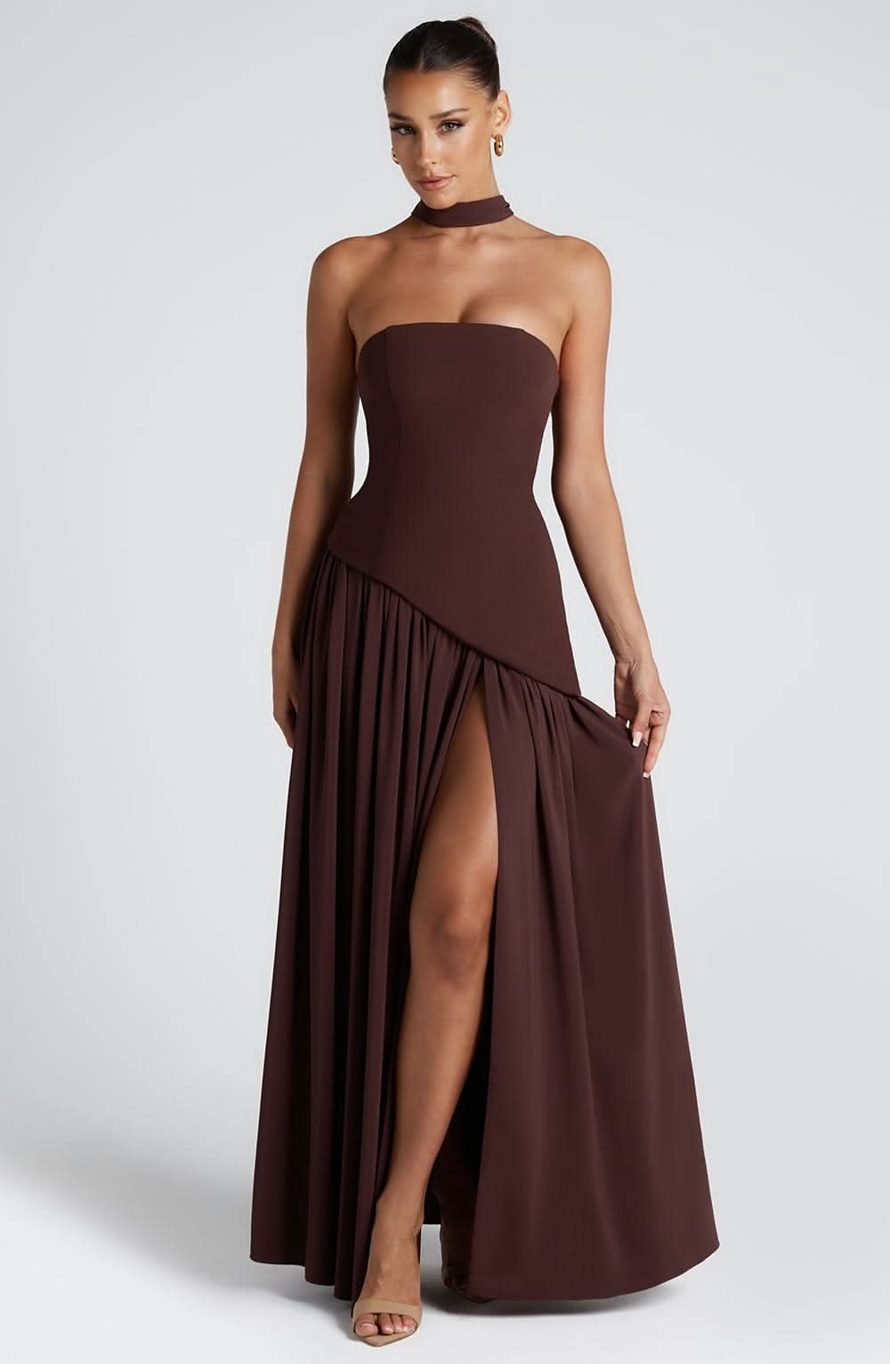 Brown wrap maxi dress with strapless bodice and asymmetrical draped skirt