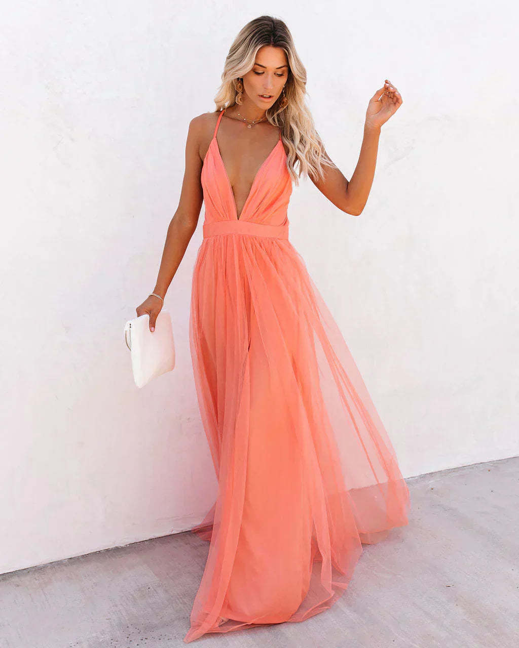 Front view coral tulle maxi dress with plunging neckline and open back
