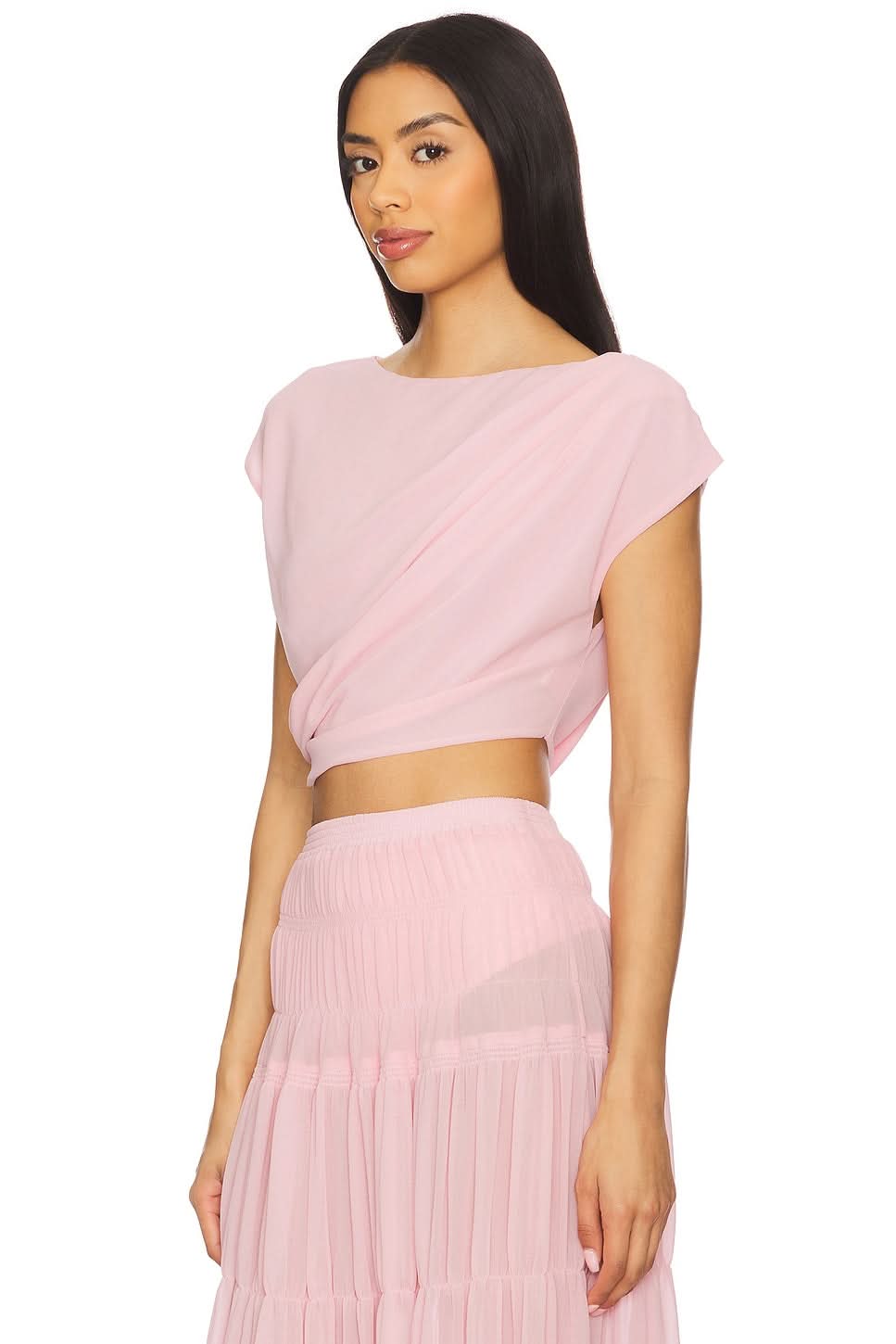 Side profile of blush two-piece maxi set highlighting wrap top construction