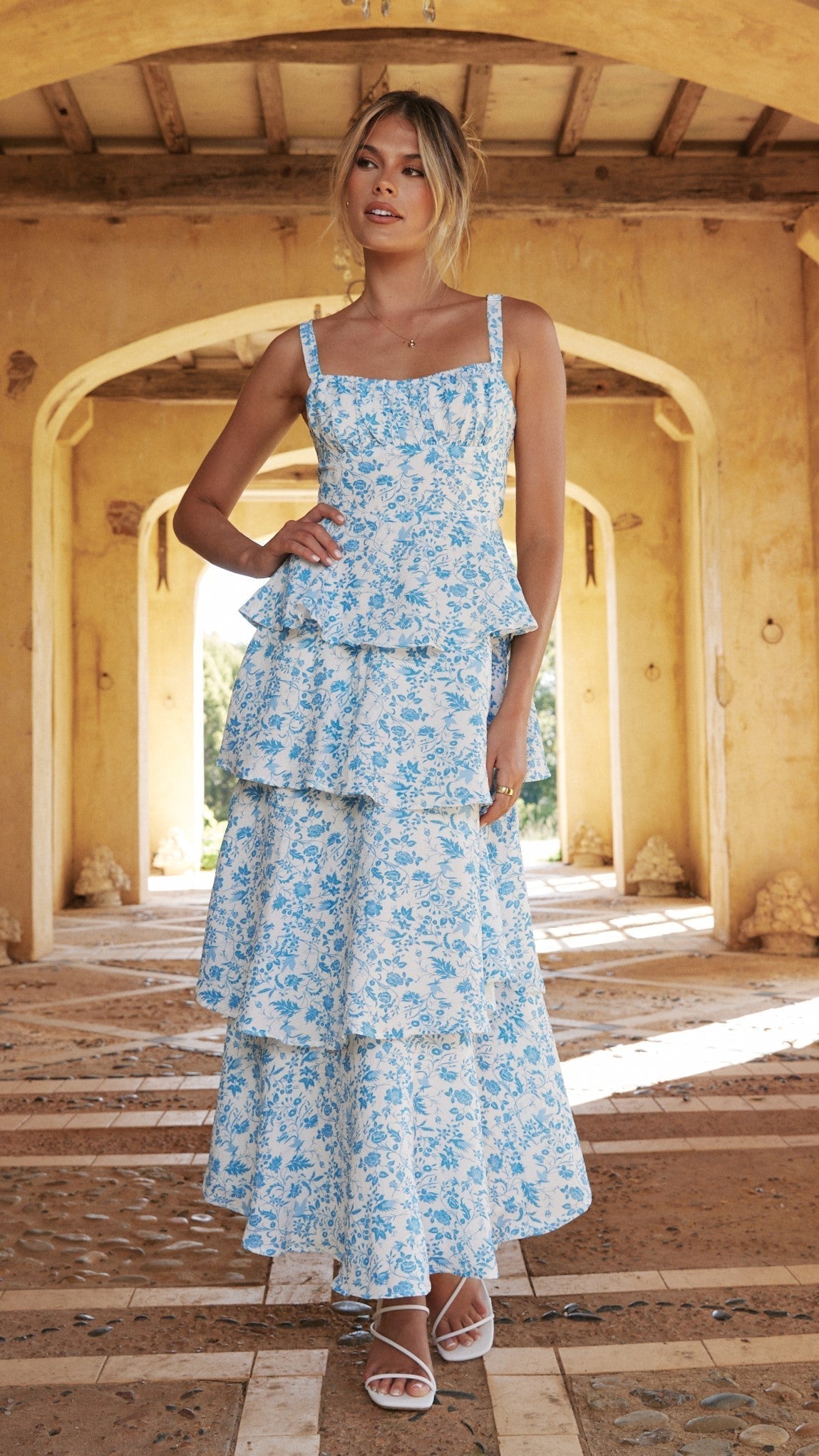 Blue floral print maxi dress with tiered ruffles and square neckline