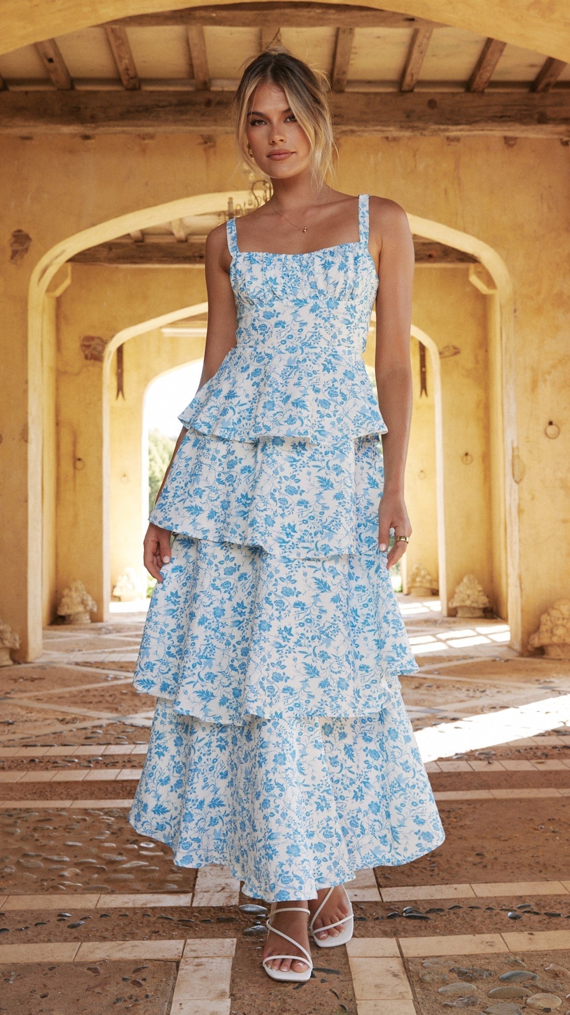 Blue floral maxi dress with tiered ruffle layers and square neckline