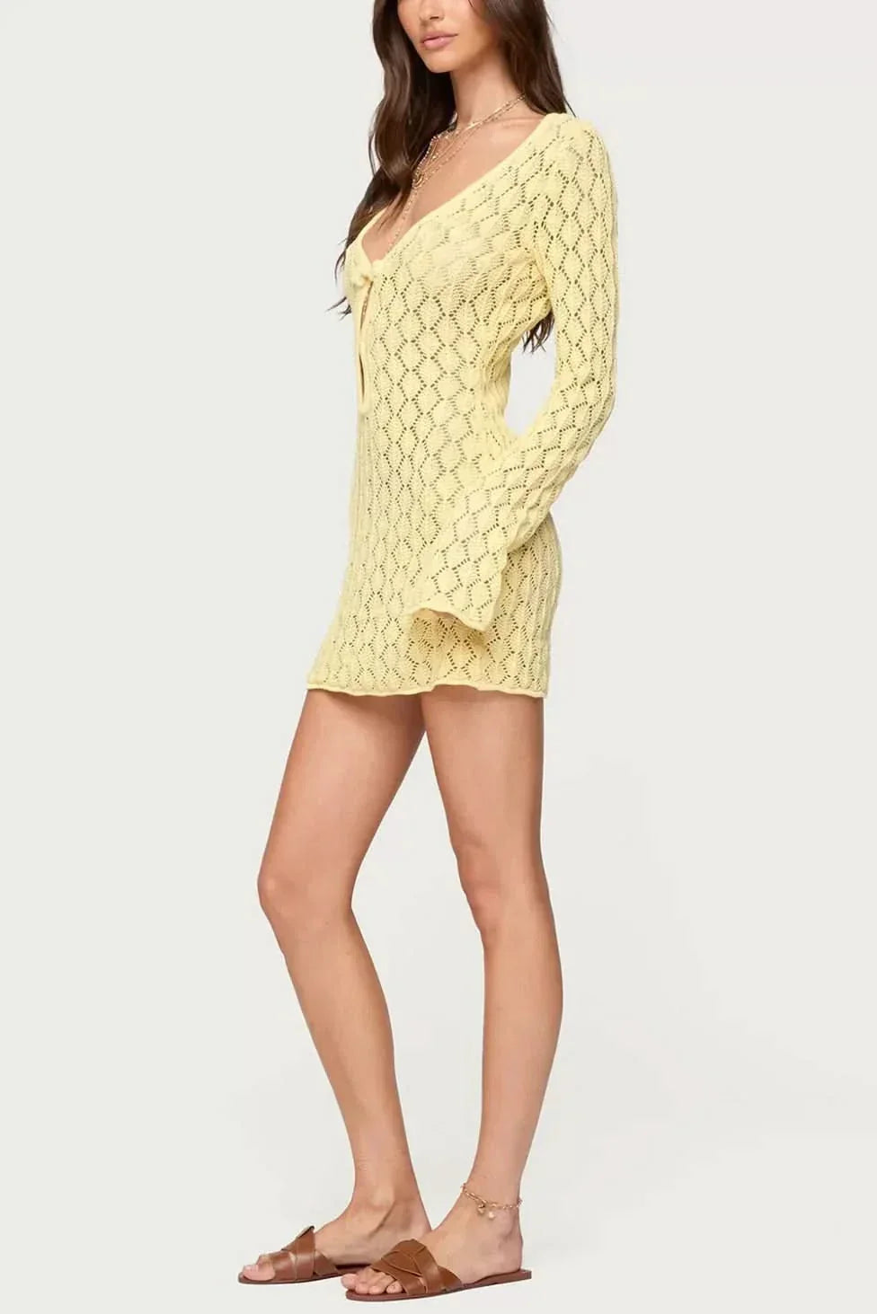 Yellow openwork mini dress with tie-front neckline and fitted long sleeves