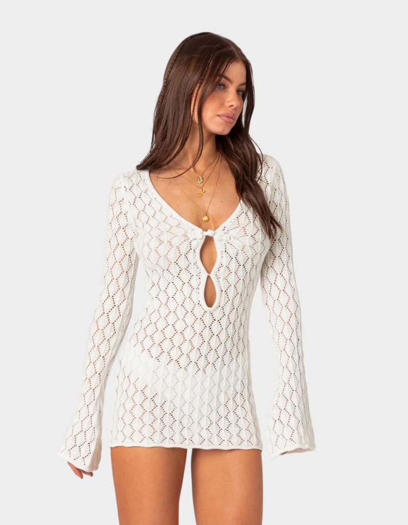 Cream crochet tie-front mini dress with long bell sleeves and open diamond knit