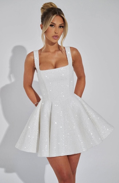 White sequin mini dress front view with square straps and pockets