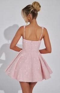Blush pink sequin mini dress front view with pockets and straps