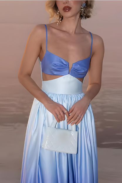 Close-up of blue ombre maxi dress showing sweetheart neckline and side waist cutout detail