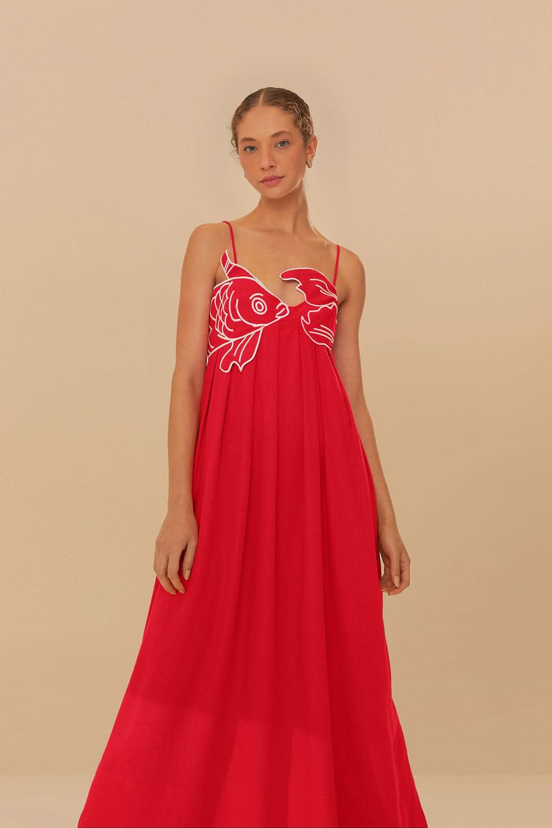 Red flowing maxi dress with fish embroidery front view close-up