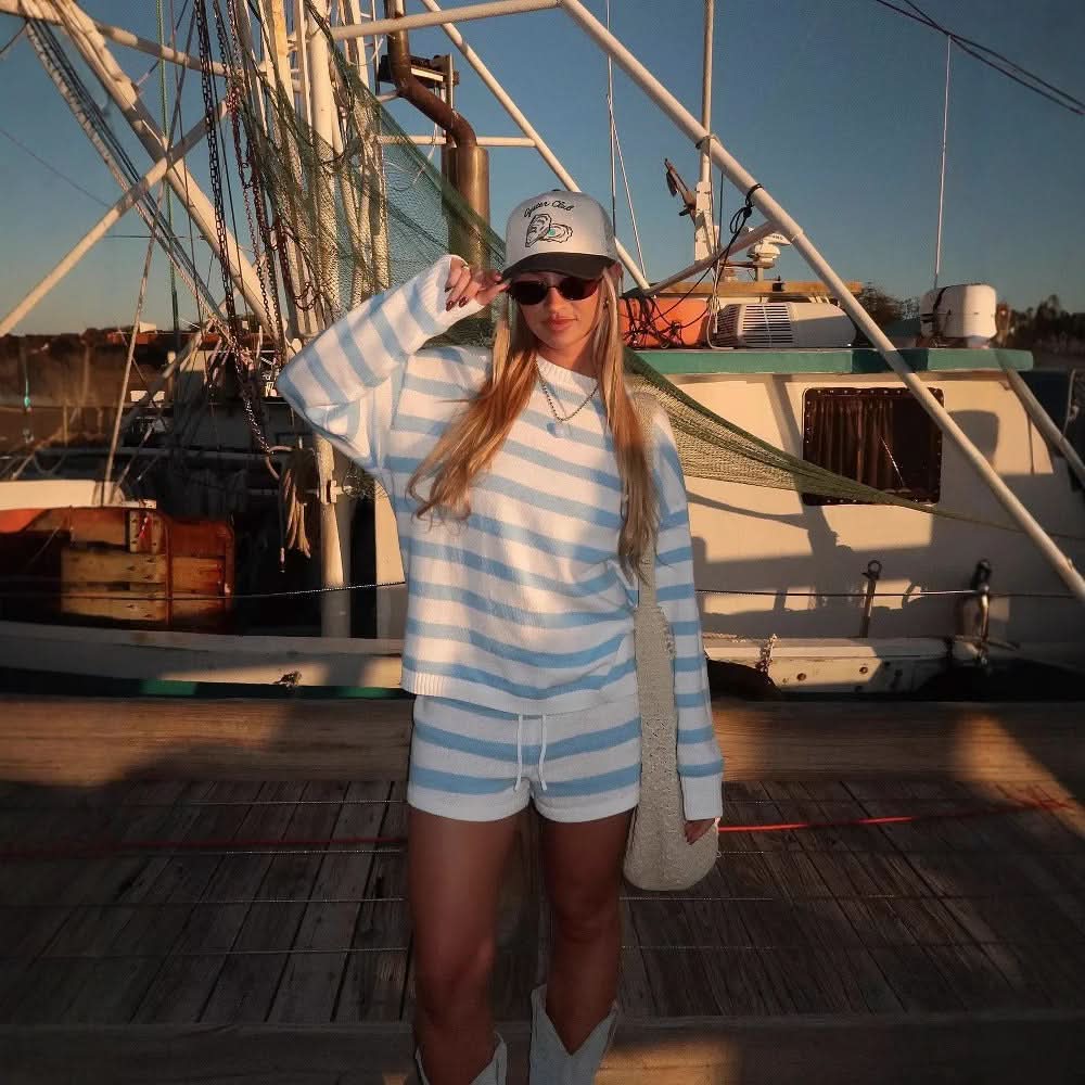 Blue and white horizontal striped knit sweater and shorts ensemble