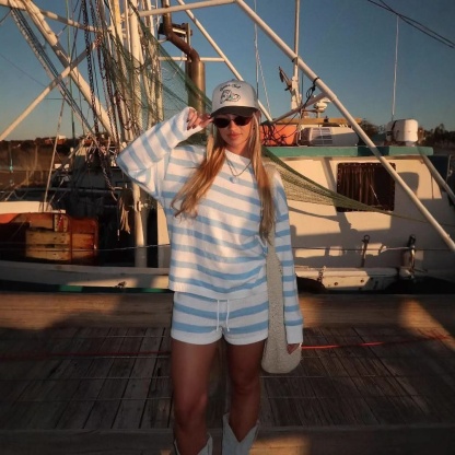 Blue and white horizontal striped knit sweater and shorts ensemble