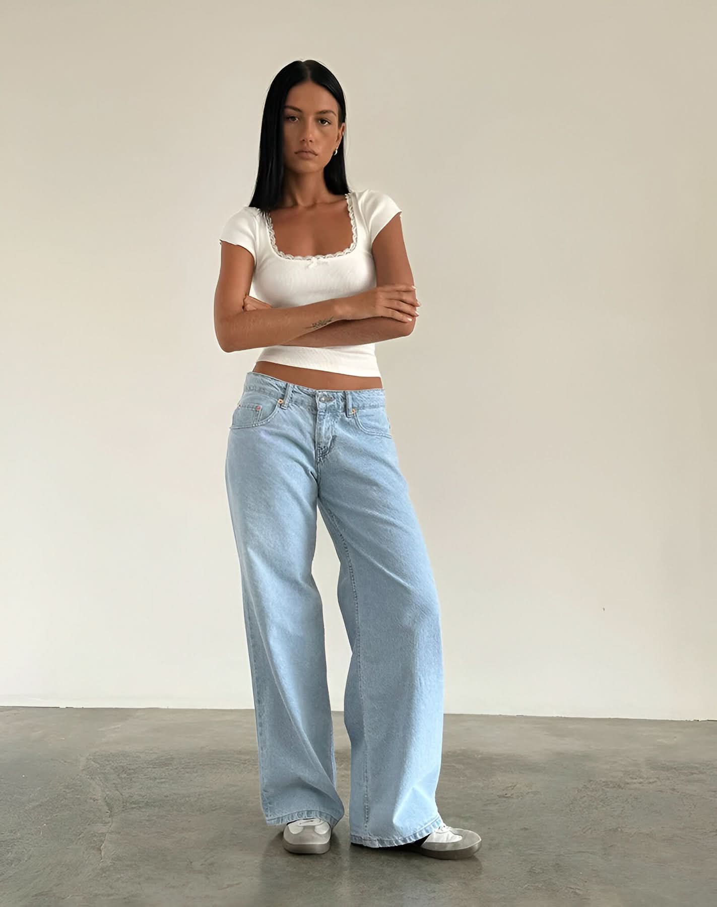 Pale blue wide leg jeans with relaxed fit and vintage wash