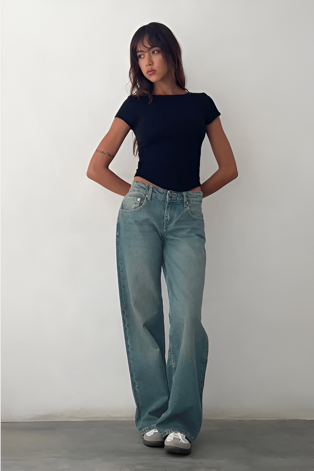 Light blue wide leg jeans with straight silhouette and classic five-pocket styling