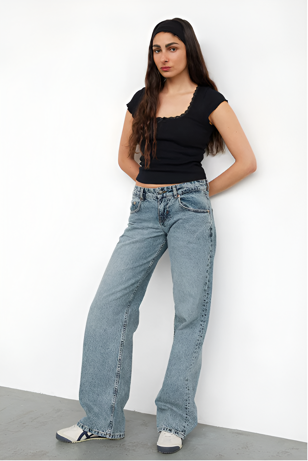 Medium wash wide leg jeans with classic five pocket styling
