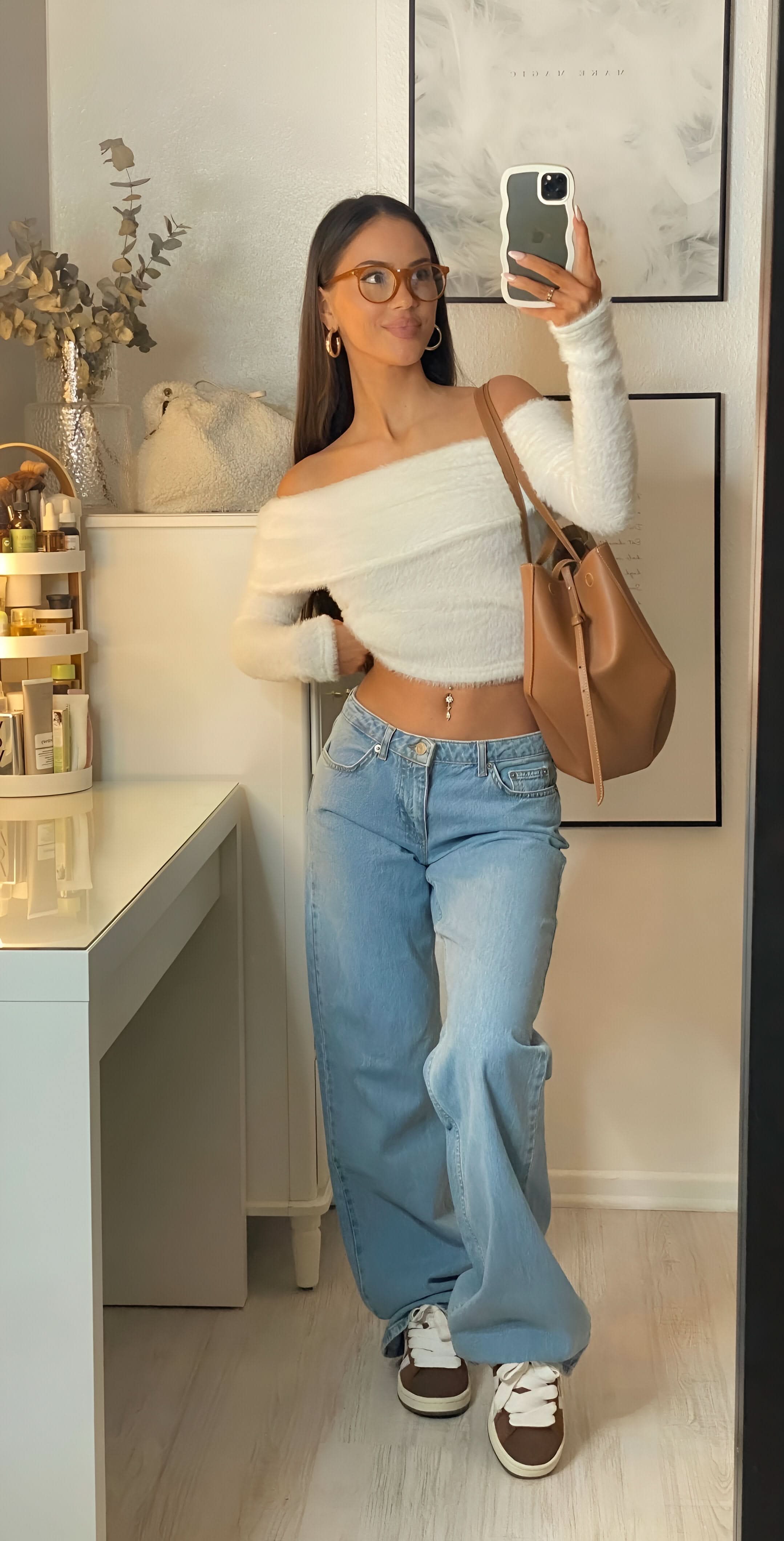 Light blue wide leg jeans with relaxed fit and visible seaming