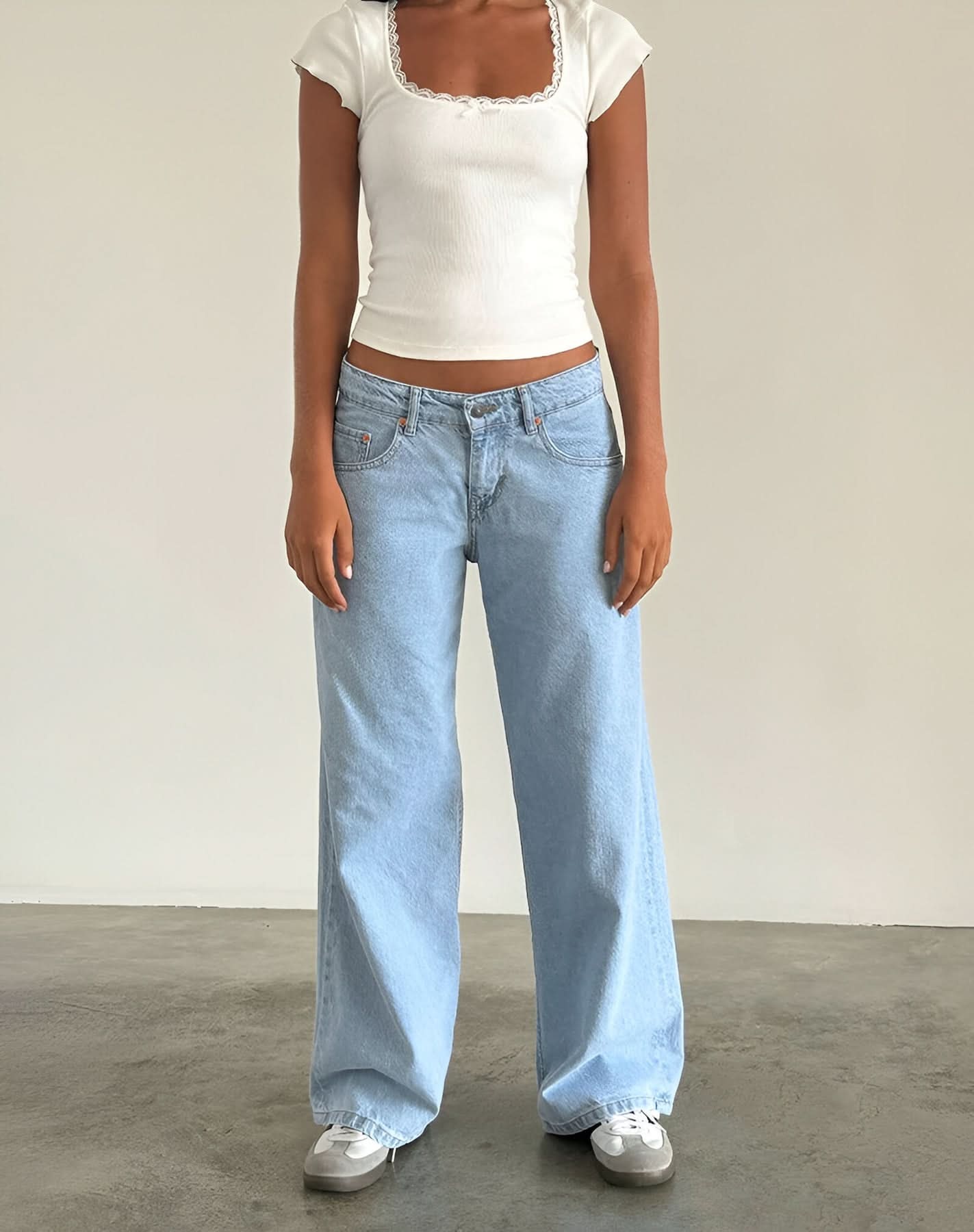 Light wash wide leg jeans with high rise and spacious leg opening