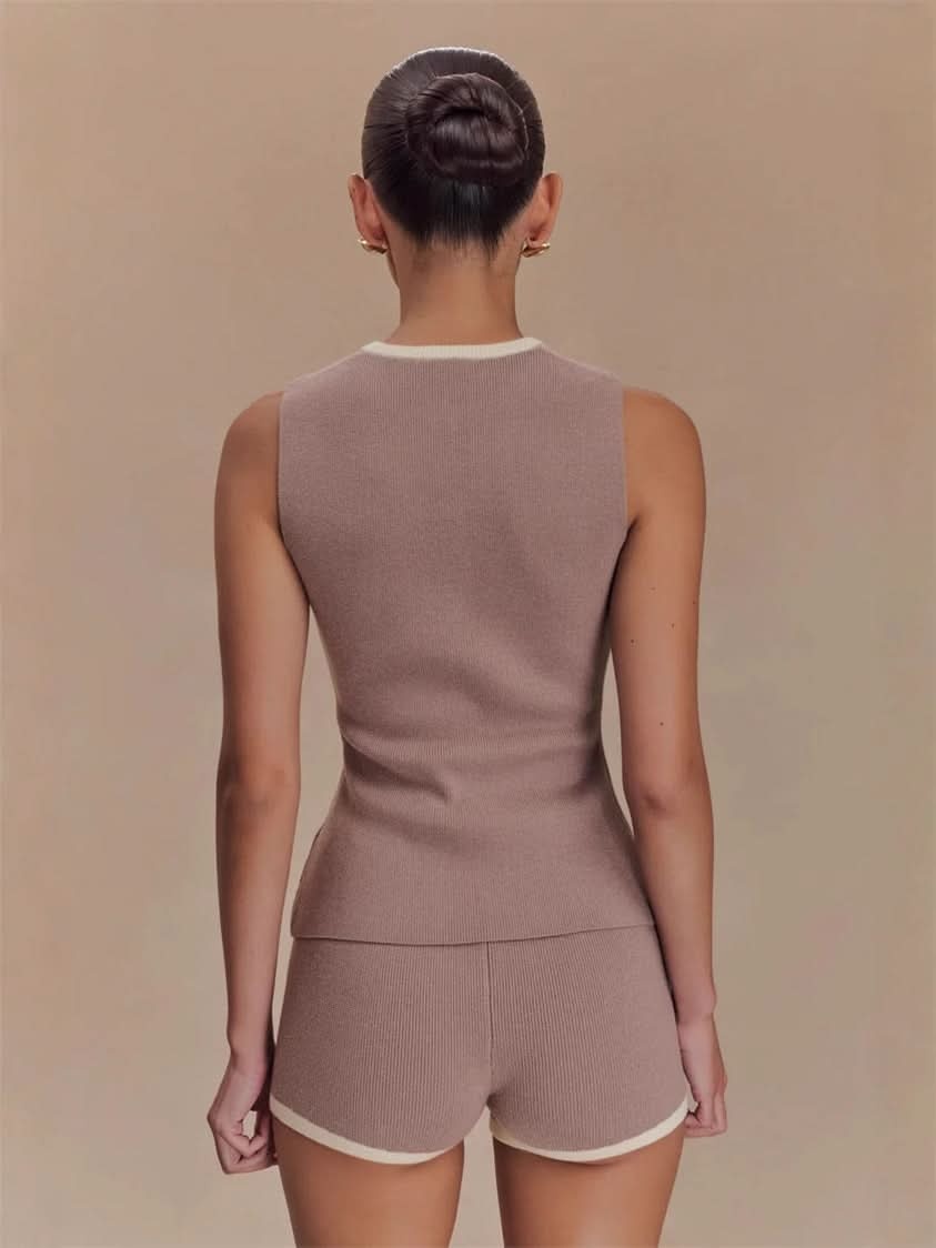 Back view of taupe sleeveless knit top with cream neckline trim