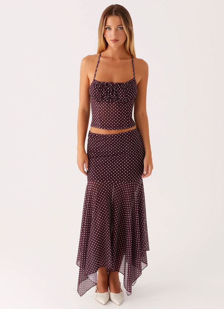 Burgundy polka dot ruched crop top and asymmetrical midi skirt set
