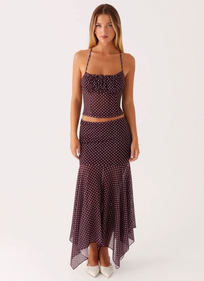 Burgundy polka dot ruched crop top and asymmetrical midi skirt set