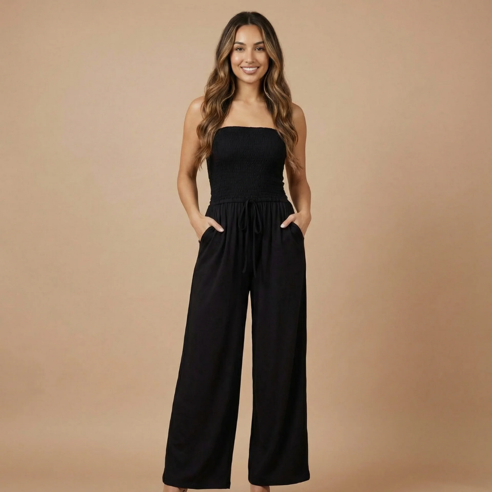 Black strapless smocked maxi jumpsuit with wide-leg pants and front pockets
