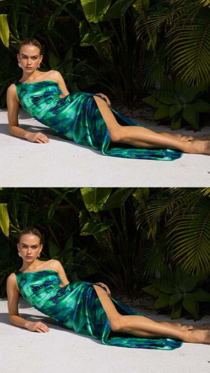Seated pose of one-shoulder green floral maxi dress with waist cutout and slit