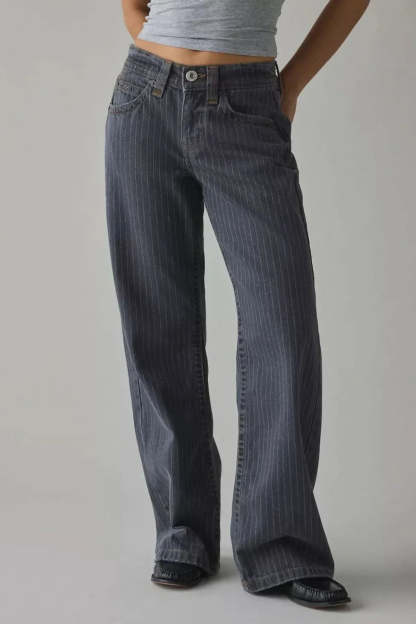 High-rise waistband detail of dark indigo pinstripe jeans with 5-pocket design