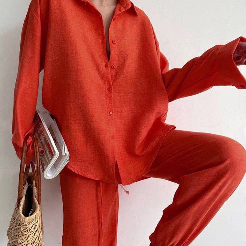 Rust-orange linen 2-piece outfit with button-front shirt and relaxed wide-leg trousers