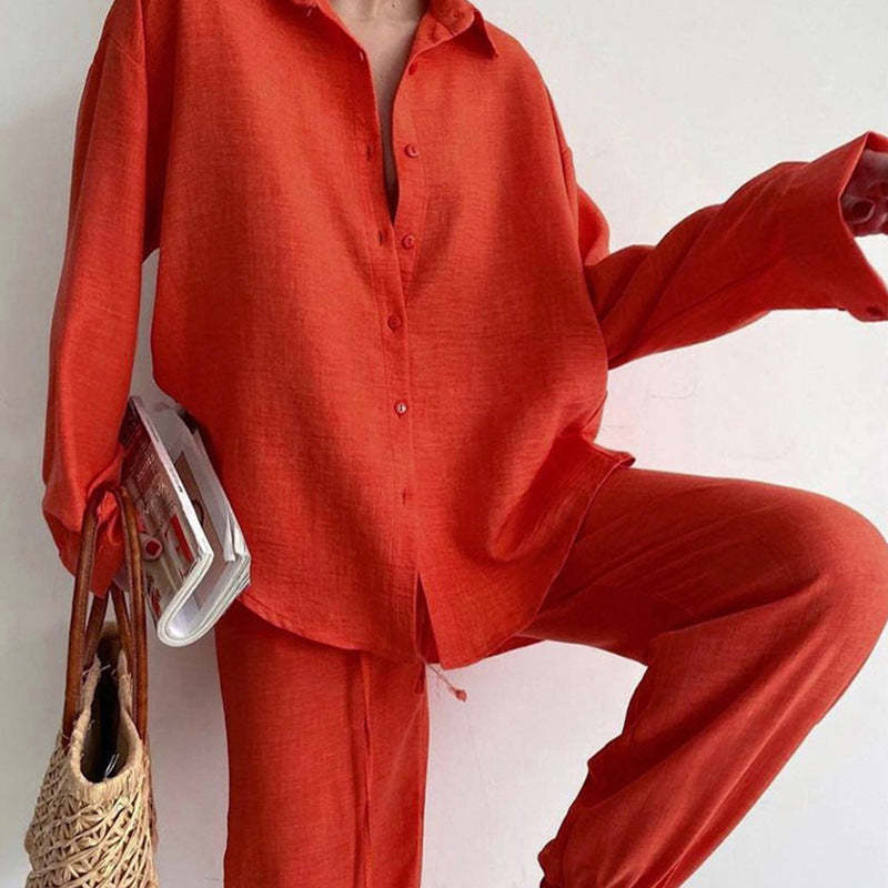 Rust-orange linen 2-piece outfit with button-front shirt and relaxed wide-leg trousers