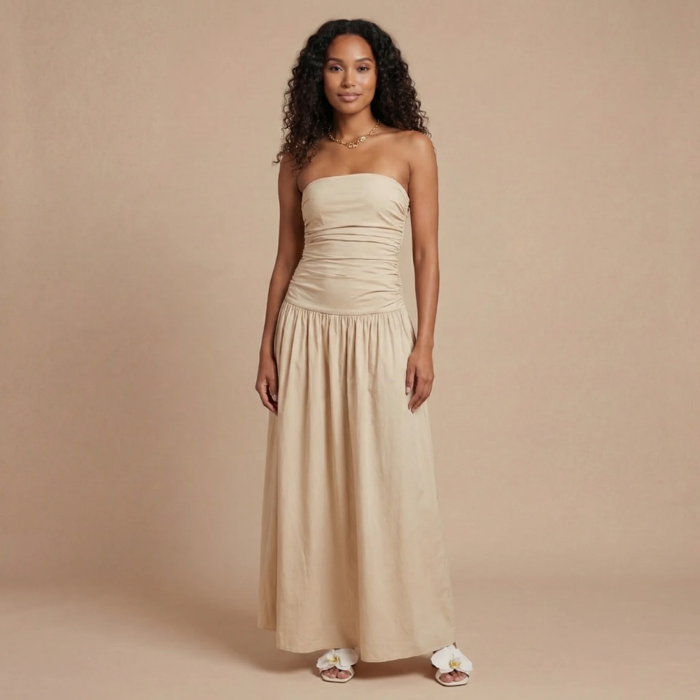 Cream strapless ruched maxi dress with flowing skirt