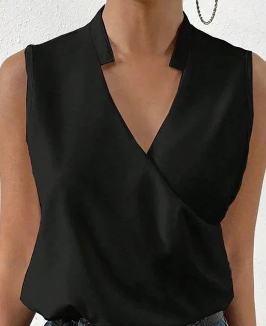 Black wrap notch collar sleeveless top with structured shoulders