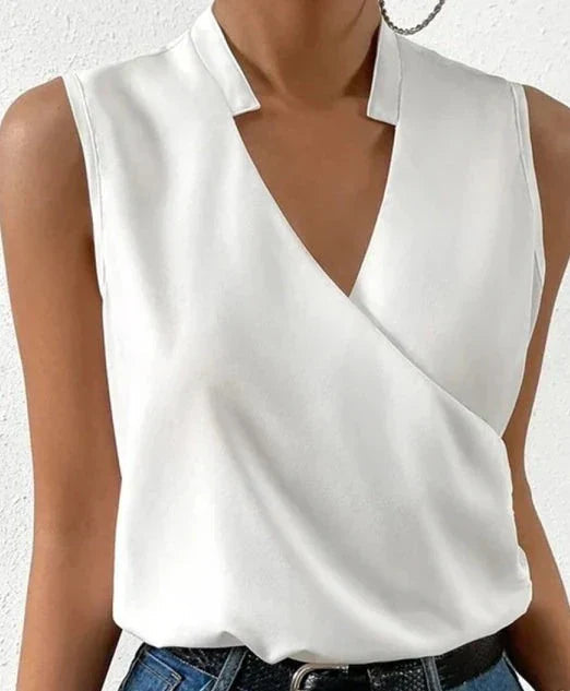 White wrap notch collar sleeveless top with V-neckline