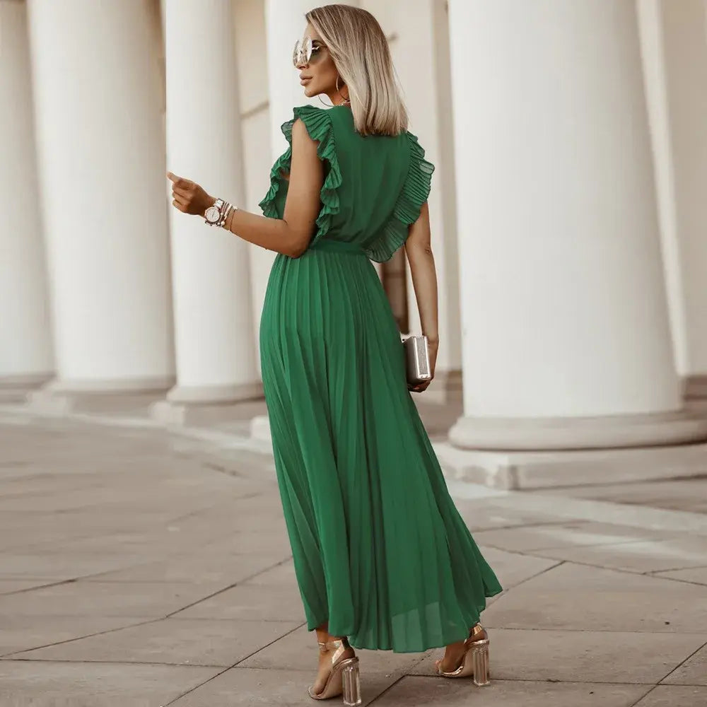 Back view green ruffle maxi dress with pleated skirt detail