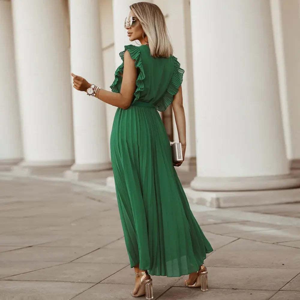 Back view green ruffle maxi dress with pleated skirt detail