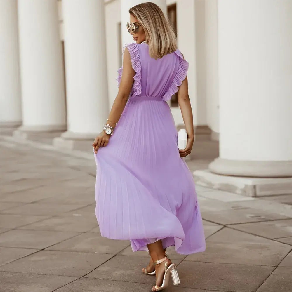 Back view lavender maxi dress with flowing pleated fabric
