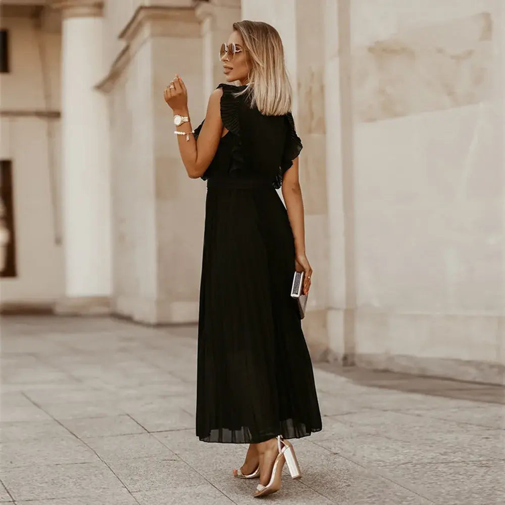 Black ruffle maxi dress back view with textured armholes