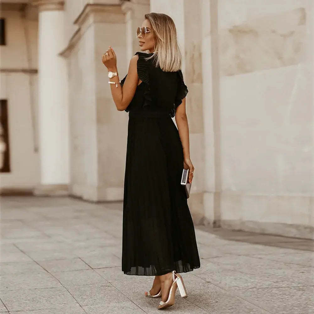 Black ruffle maxi dress back view with textured armholes