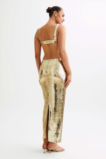 Gold sequin maxi dress back view with open back cutout
