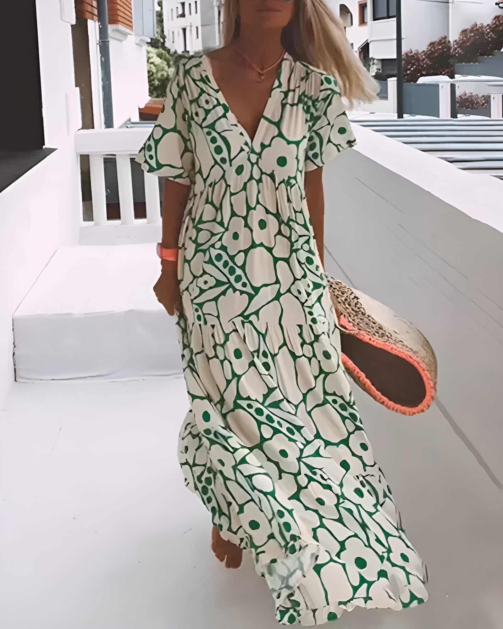 Green and cream floral maxi dress with short sleeves and V-neckline
