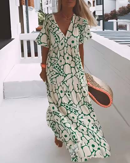 Green and cream floral maxi dress with short sleeves and V-neckline