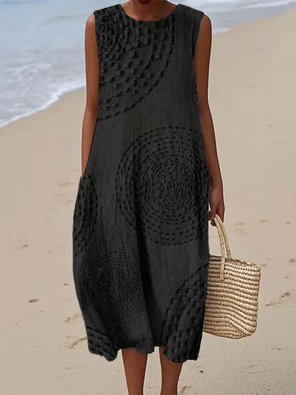 Black sleeveless maxi dress with dimensional textured circles and pockets