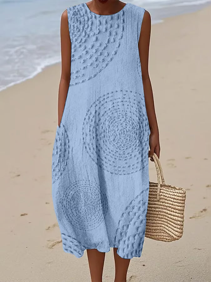 Light blue textured maxi dress with round neckline and relaxed silhouette