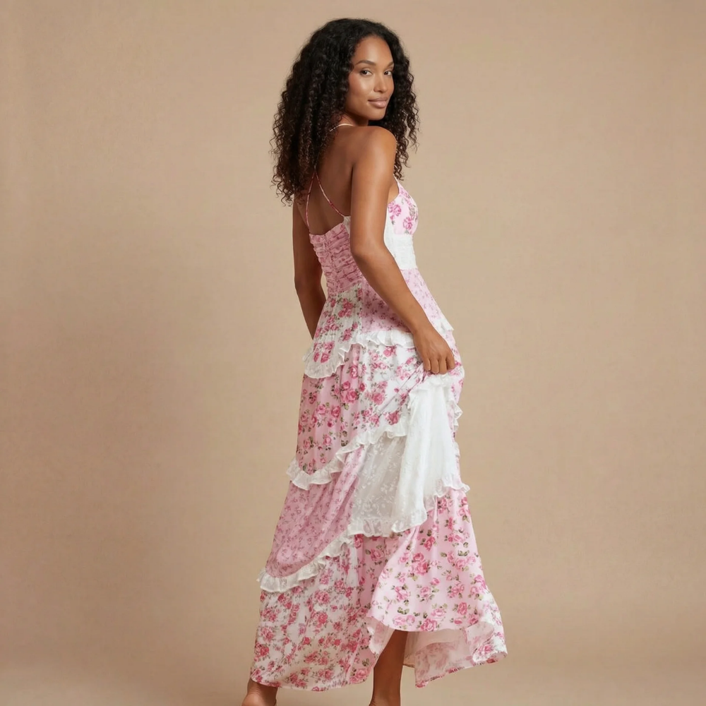 Back view of pink floral ruffled dress showing crossed spaghetti straps