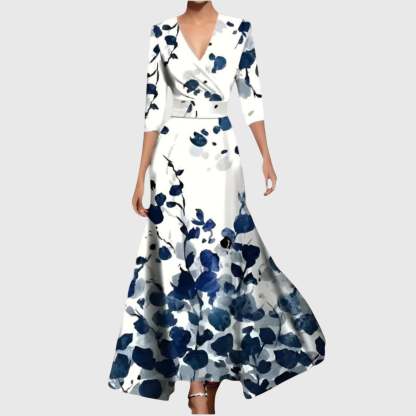 White wrap maxi dress with navy blue floral print, three-quarter sleeves, flowing skirt