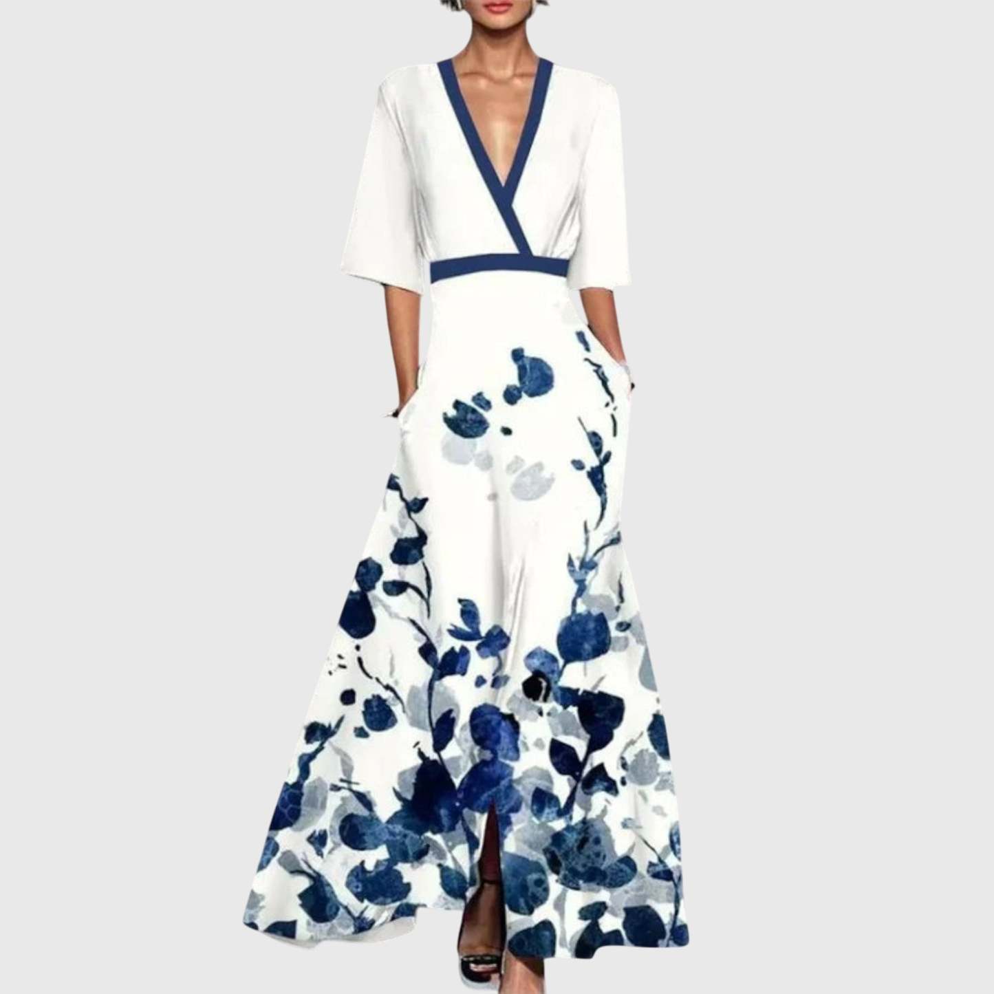 Cream wrap maxi dress with navy blue floral print, navy trim, half sleeves and slit hem