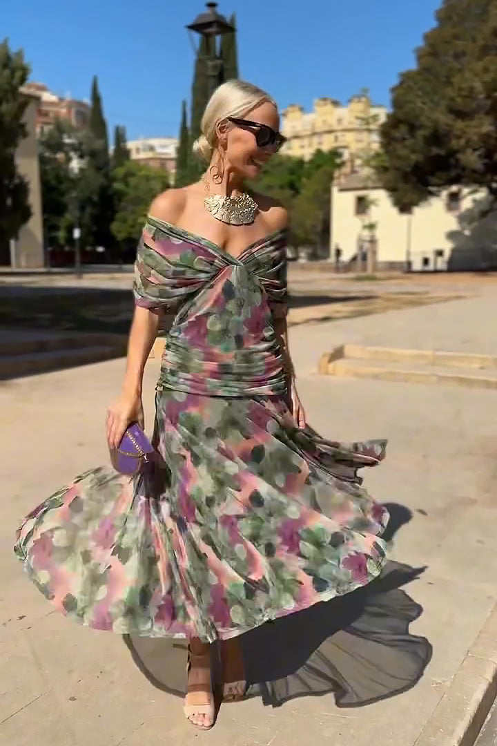 Multicolor floral draped maxi dress full-length showing wrapped bodice and hem