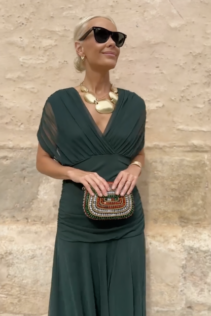 Forest green wrap maxi dress with flowing draped skirt detail