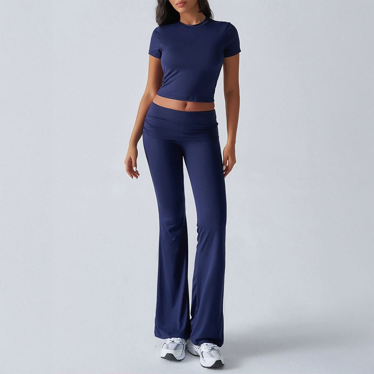 Navy ruched lounge set with fitted crop top and high-waist flare pants