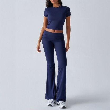 Navy ruched lounge set with fitted crop top and high-waist flare pants