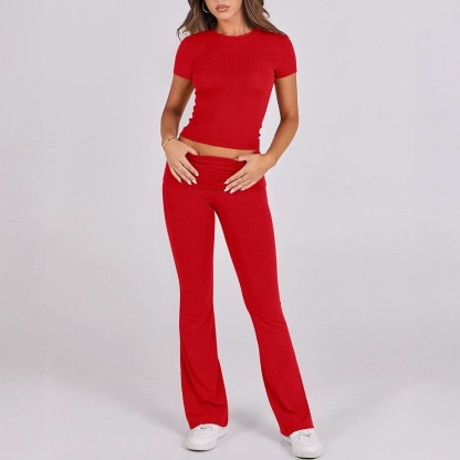 Bright red ruched lounge set with short sleeves and high-waist ruched flare bottoms